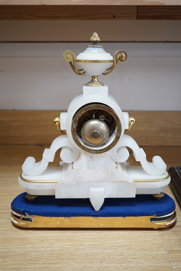 A late 19th century French ormolu mantel clock and another clock in an alabaster case, 39cm. Condition - fair to good